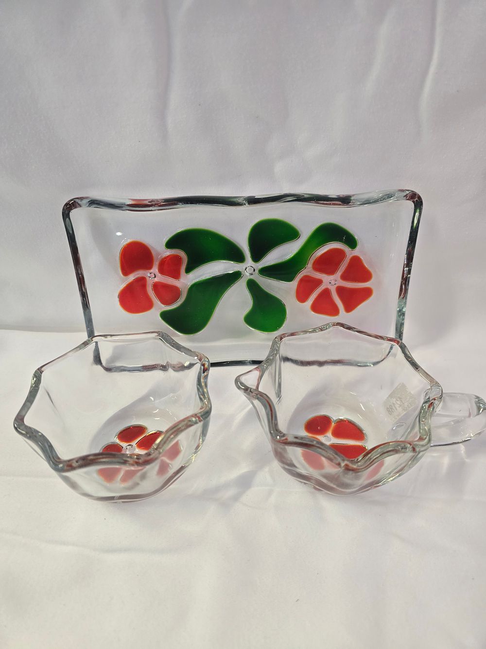 Lot 304: vintage Walther Glas tray, sugar bowl, and creamer set with a floral design