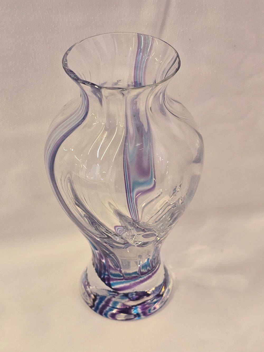 Lot 312: vintage Caithness pink swirl glass vase. It is a handmade art glass piece from Scotland, the "Flamenco" pattern In purple