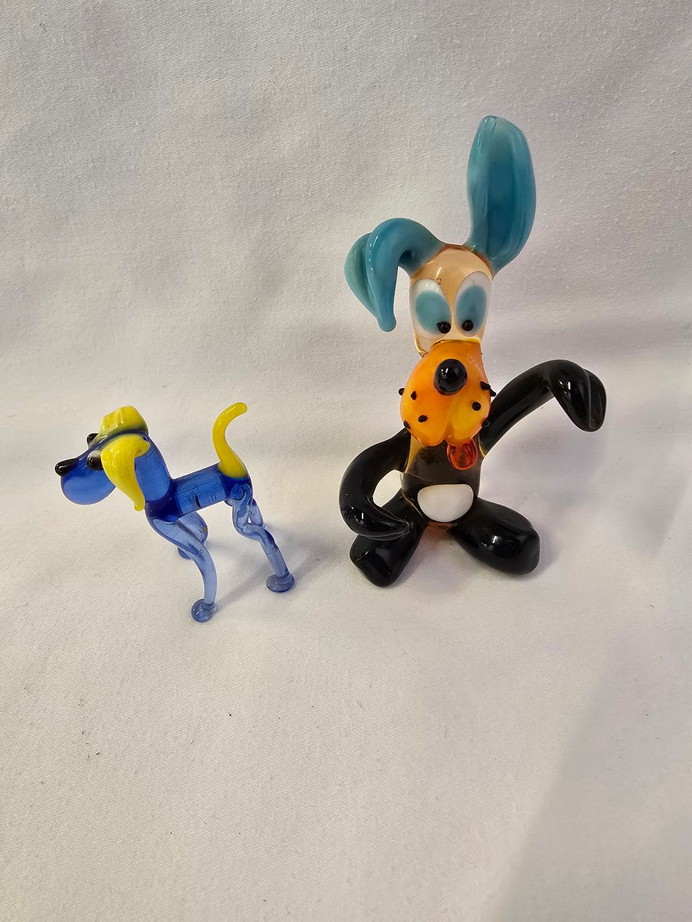 Lot 316: Two murano handmade blown vintage dog figures.