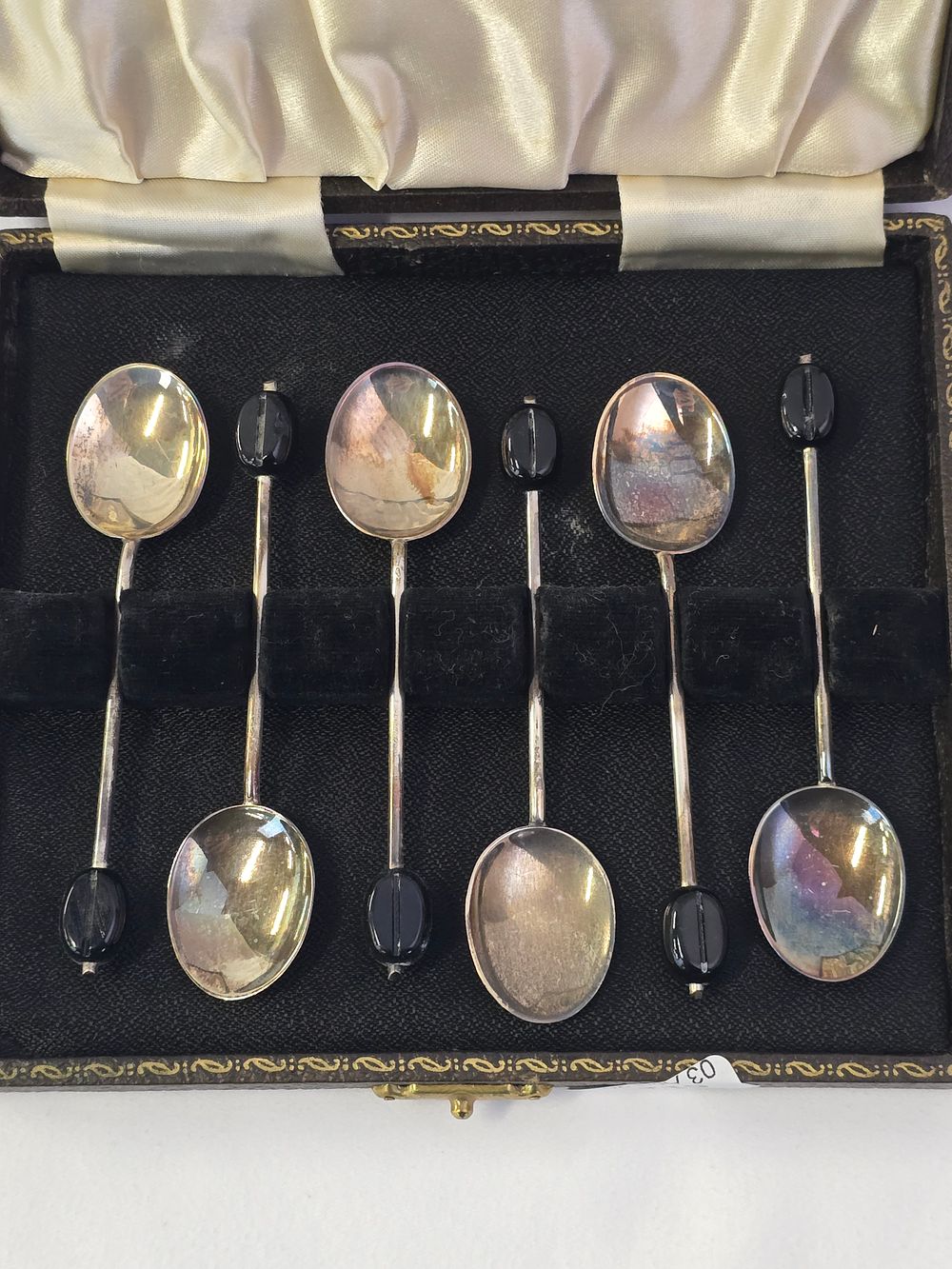 Lot 317: A set of John Nix sterling silver coffee bean teaspoons