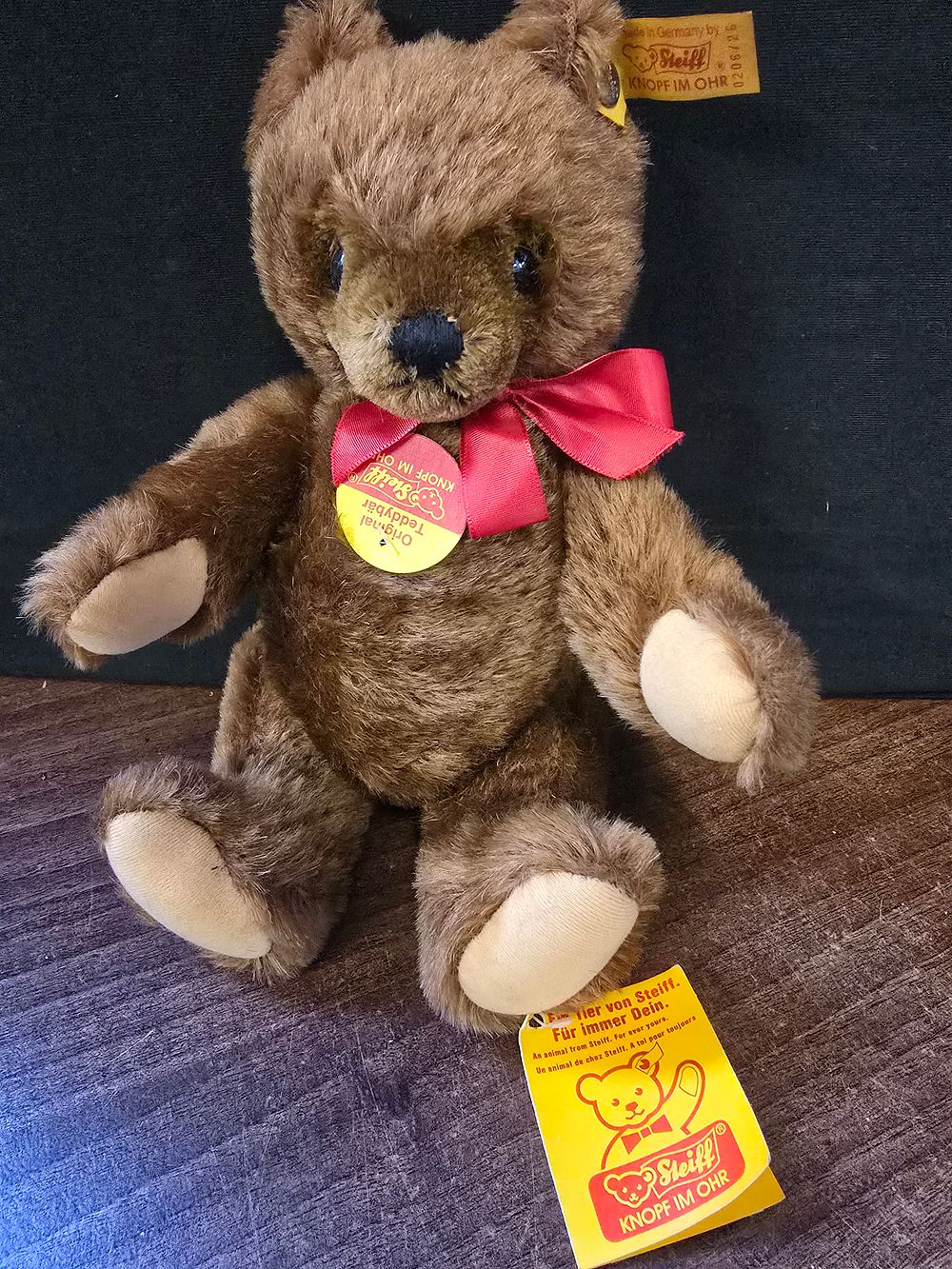 Lot 340: Vintage small brown Steiff Bear with jointed arms and legs