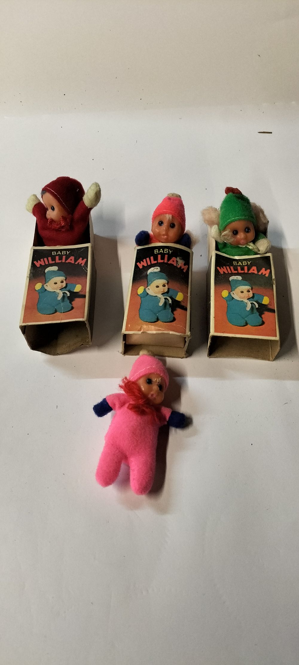 Lot 348: Three Boxed Baby William Matchbox Dolls and One Unboxed