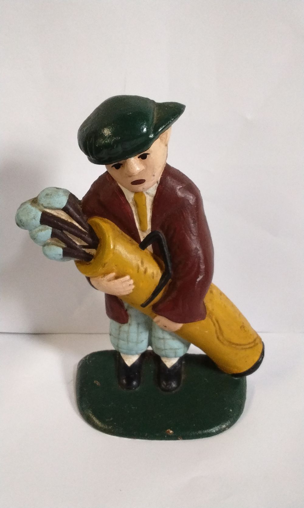 Lot 380: Cast Iron golfer Door Stop
