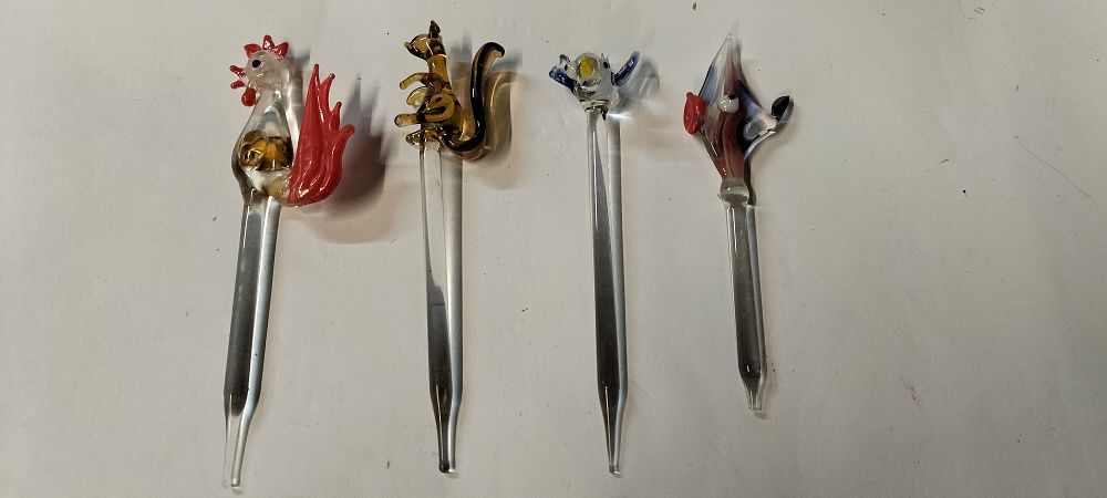 Lot 391: Four Handblown Glass Swizzle Sticks in the Style of Murano