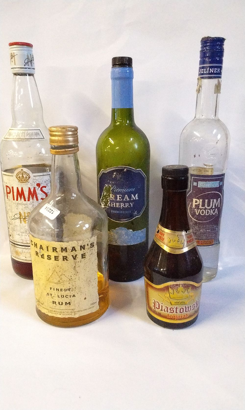Lot 738: Five Bottles of Opened Alcohol