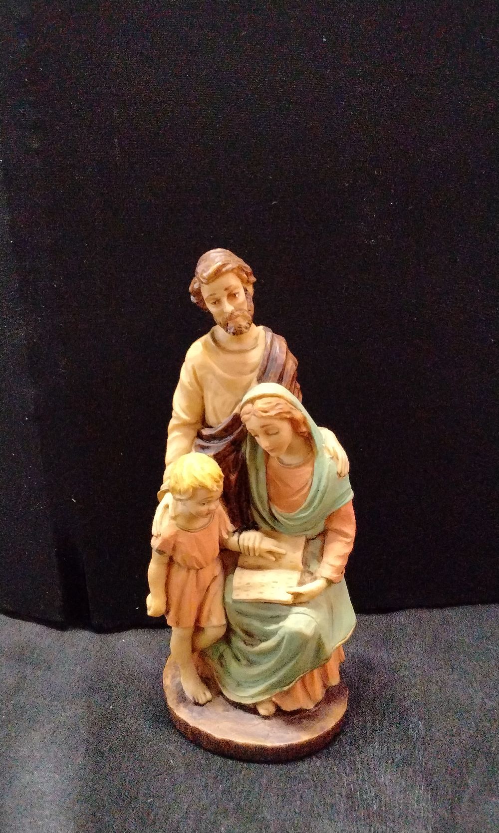 Religious figure of of a Young Jesus with his Parents. Measures Approx 22x10x7cm Marked E. T. on 