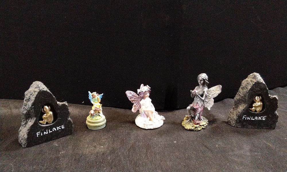 Lot 214: Three Miniature Fairies and Two Finlake Imps in Slate