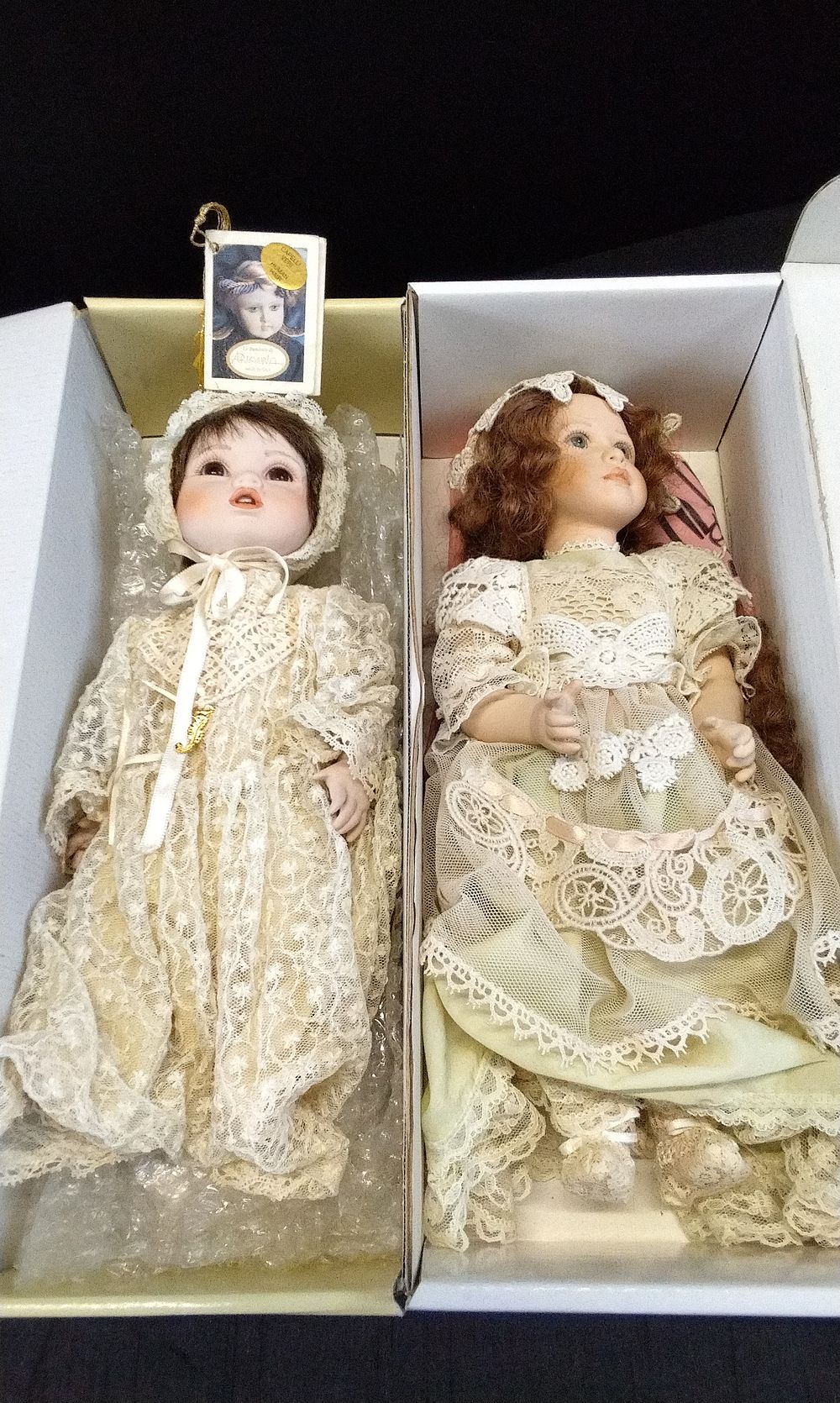 Lot 220: Two x  Boxed Solid Porcelain Dolls,