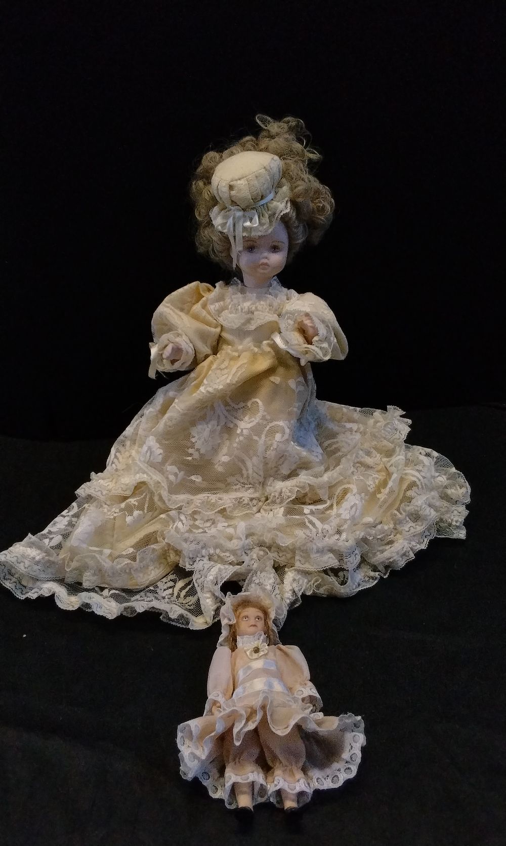 Lot 224: Two Solid Porcelain Dolls in Traditional Dress