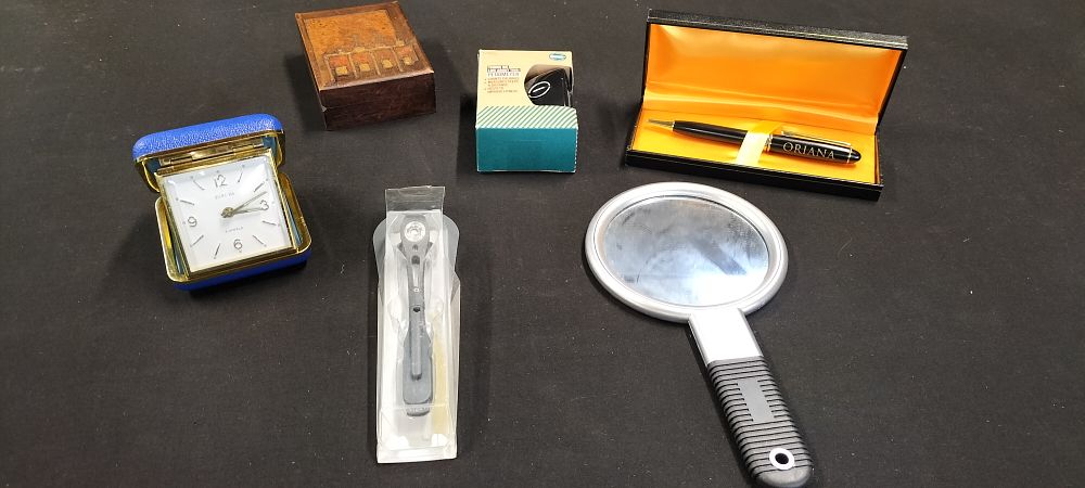 Lot 183: Mixed Lot Including a Travel Clock, a New M&S Pedometer and a Clip On Book Light