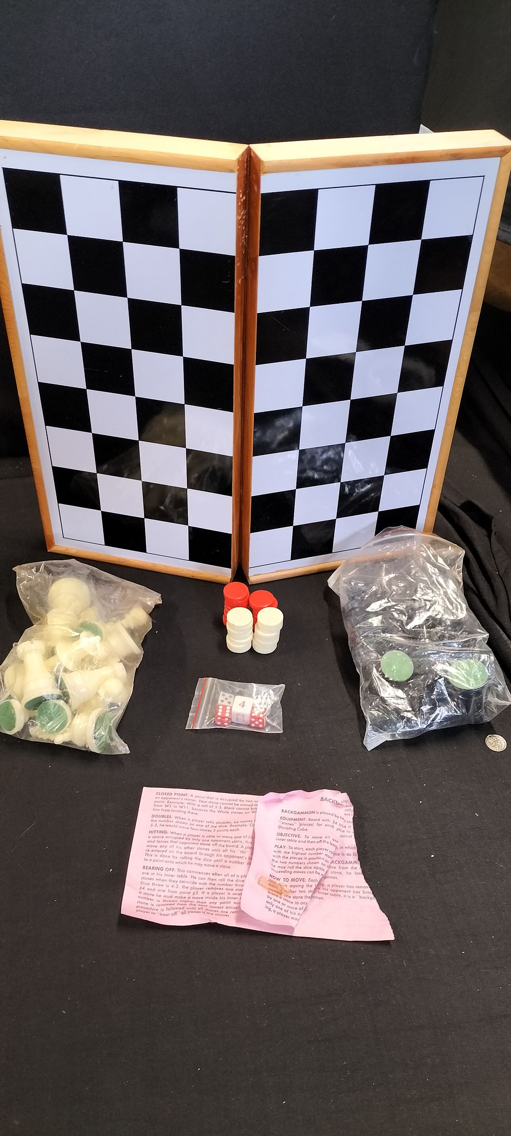 Lot 184: A Magnetic Chess and Backgammon Set with box