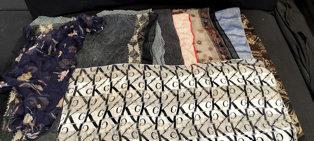 Lot 187: Nine Ladies Nylon Scarves in a Wicker Basket