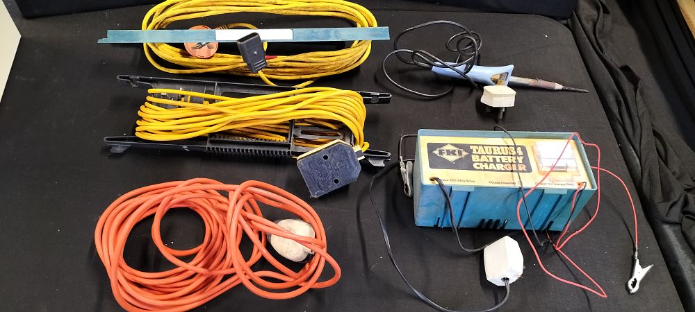 Lot 190: Three Extension Leads, A Battery Charger and a Soldering Iron