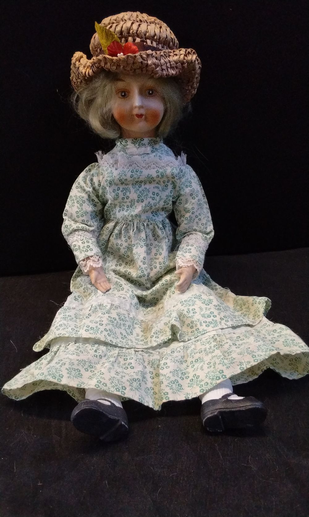 Lot 259: Half Bisque Porcelain Doll with Soft Body.