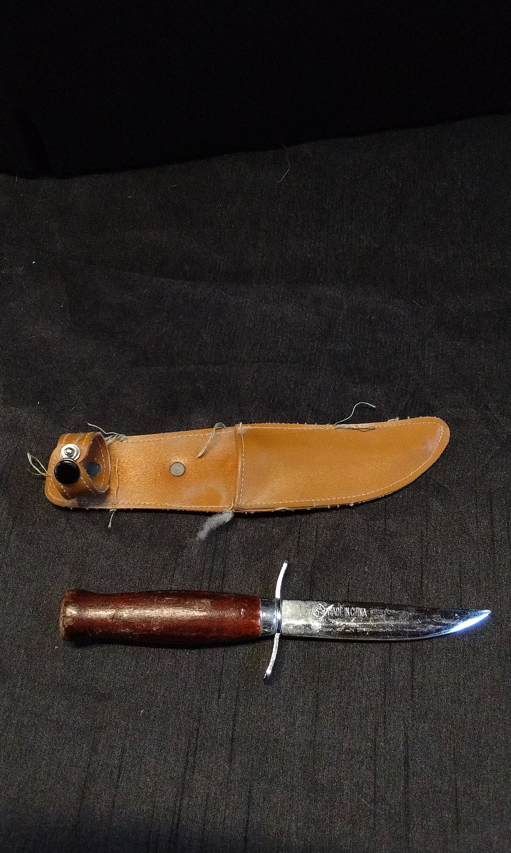 Lot 274: Boot Knife with Sheath. Blade Length Measures Approx 10 inches