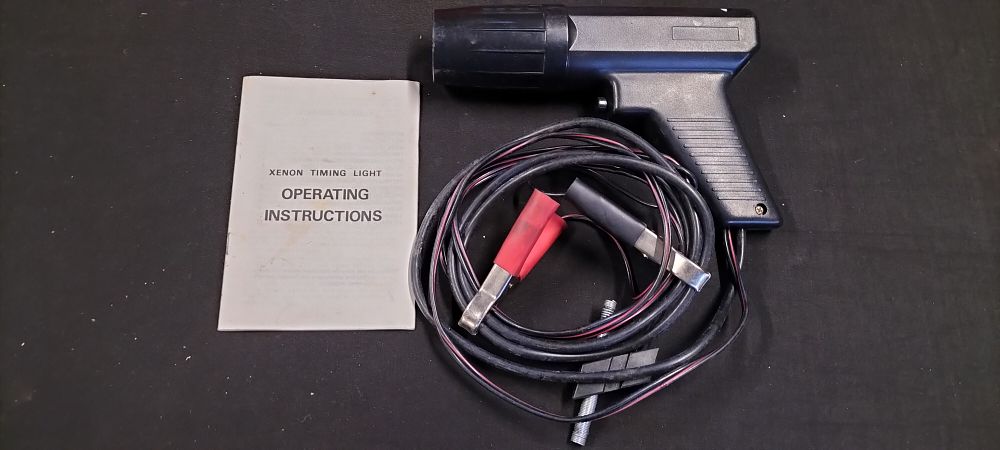 Lot 304: Xenon Timing Light with Instructions and other Car Tuning Items