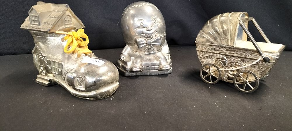 Lot 345: Three Silver Tone Children's Money Boxes