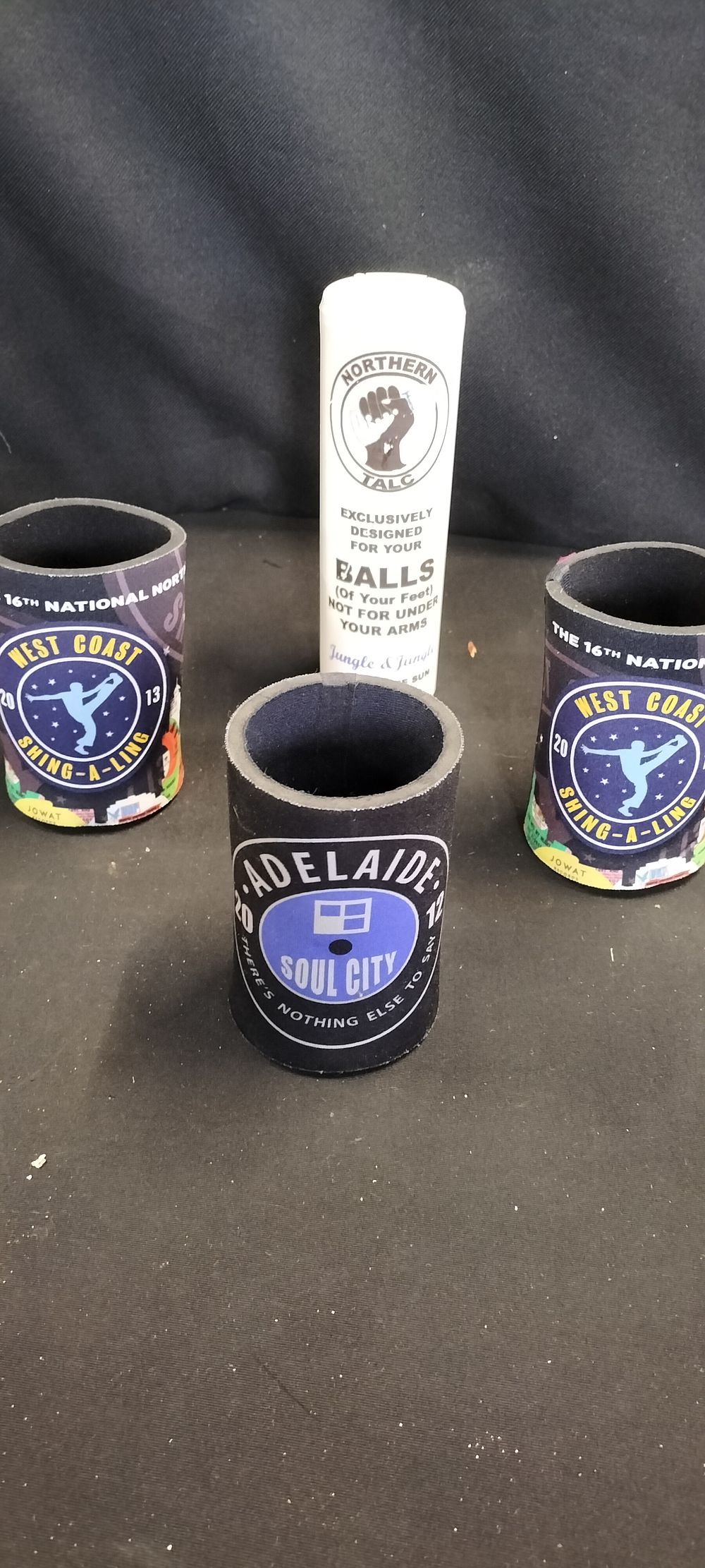 Lot 352: Three Australian Northern Soul Can/Bottle Cooler and A Container of Talc From Tenerife