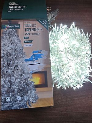 Premier 1000 LED tree rights 25m lit length 1. White multi action clear cable