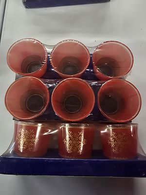 Three packs of 3 Christmas tea light candle holders. Gold snow flake design