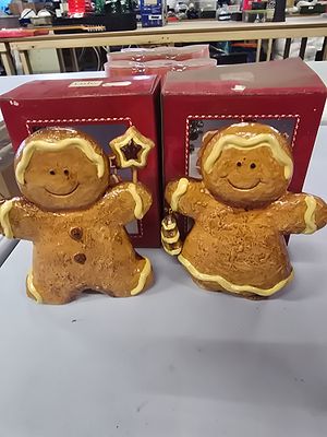 A pair of Yule ceramic ginger bread ornaments