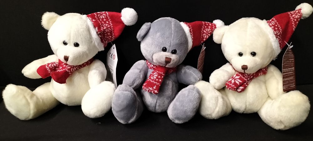 Lot 157: Three Teddy Bears Dressed in Christmas Hats and...