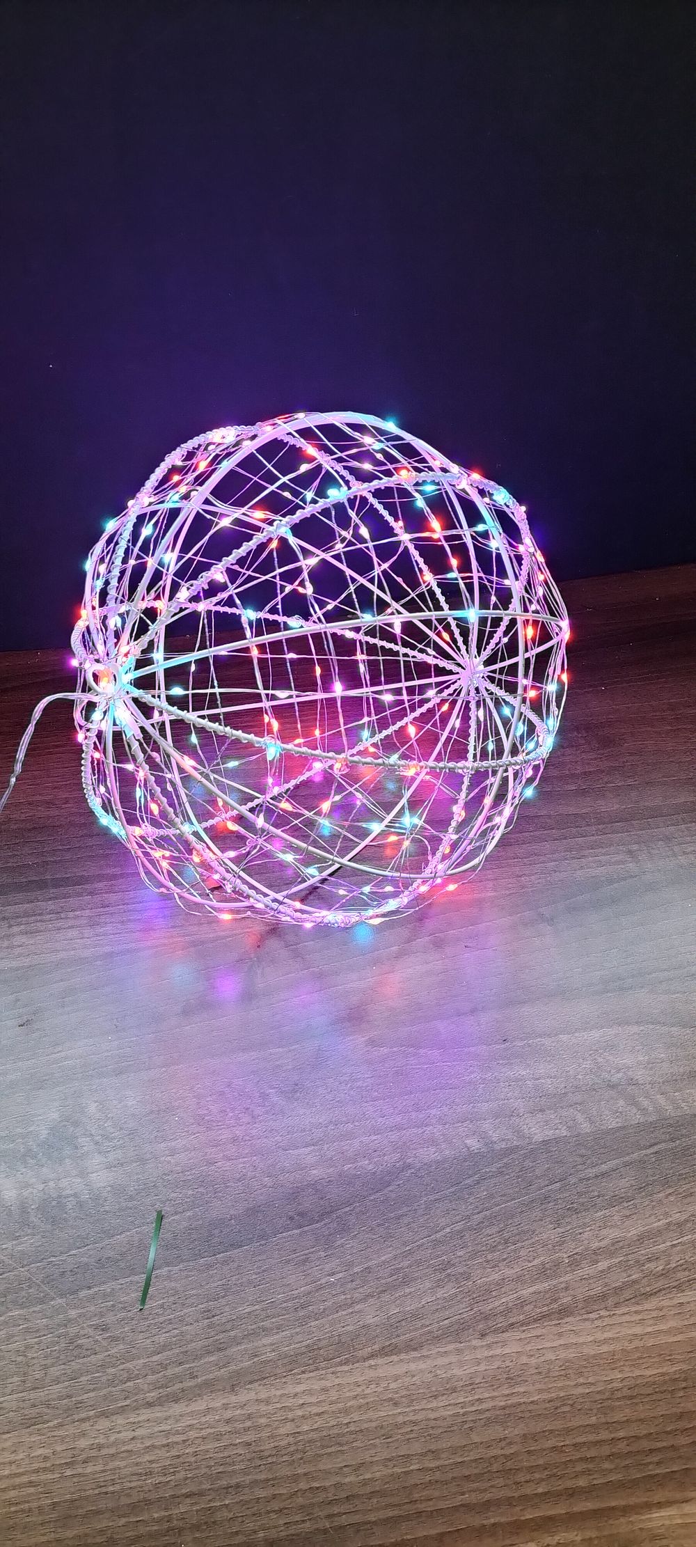 Lot 183: Wire Ball Approx 32cm Dia. Covered in Multi...