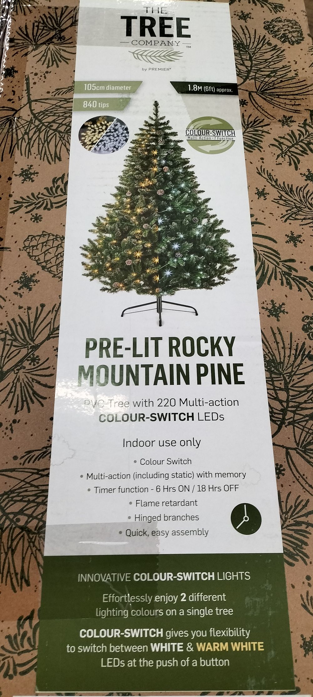 Lot 190: A Pre Lit Rocky Mountain Pine PVC Tree...