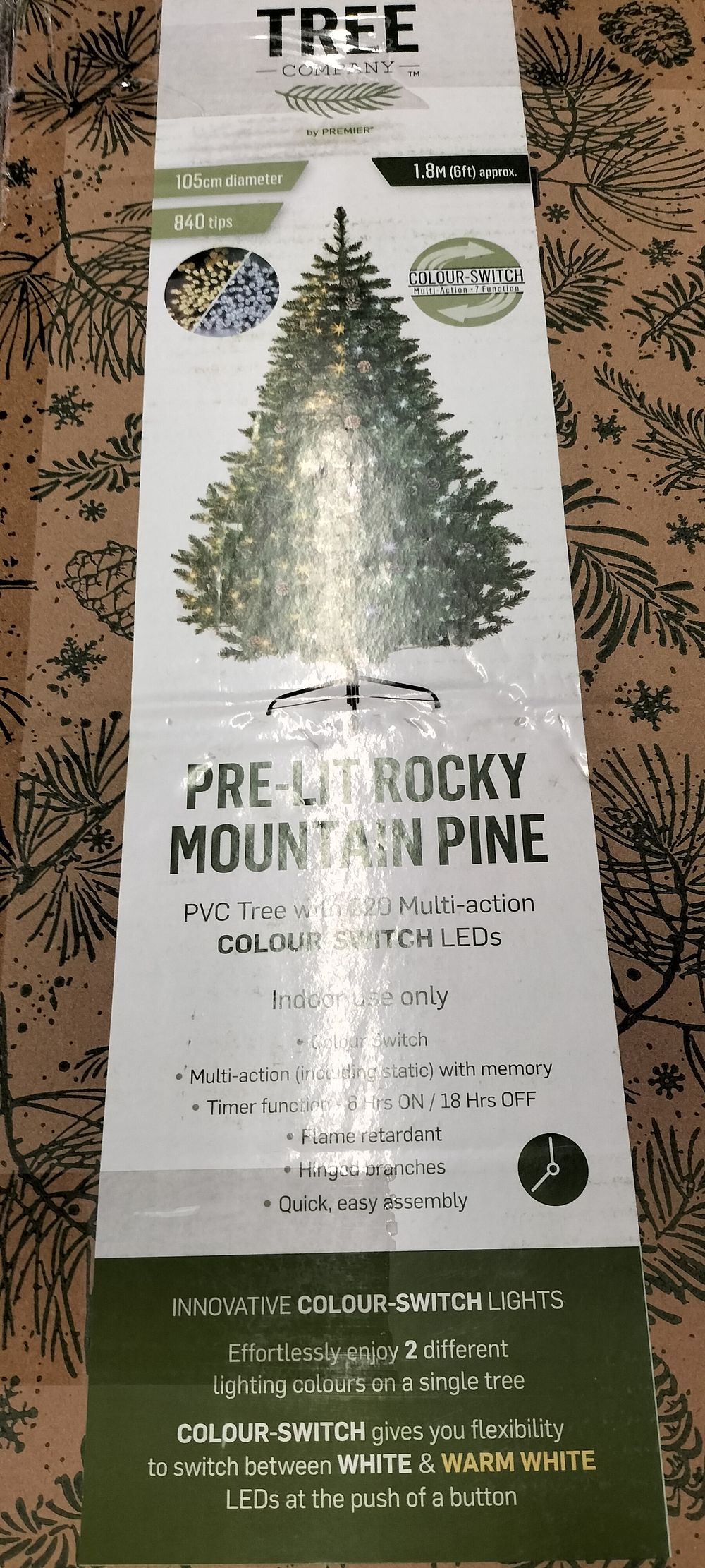 Lot 192: A Pre-Lit Rocky Mountain Pine PVC Tree with...