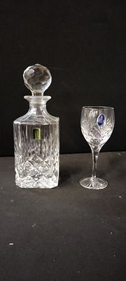 A Cathedral Crystal Decanter, Hand Cut Lead Crystal, Italy and a Royal Doulton Crystal Wine Glass