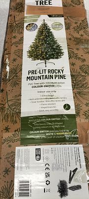 A Pre-Lit Rocky Mountain Pine PVC Tree with 220 Multi Action Colour Switch LED's, Indoor Use Only.