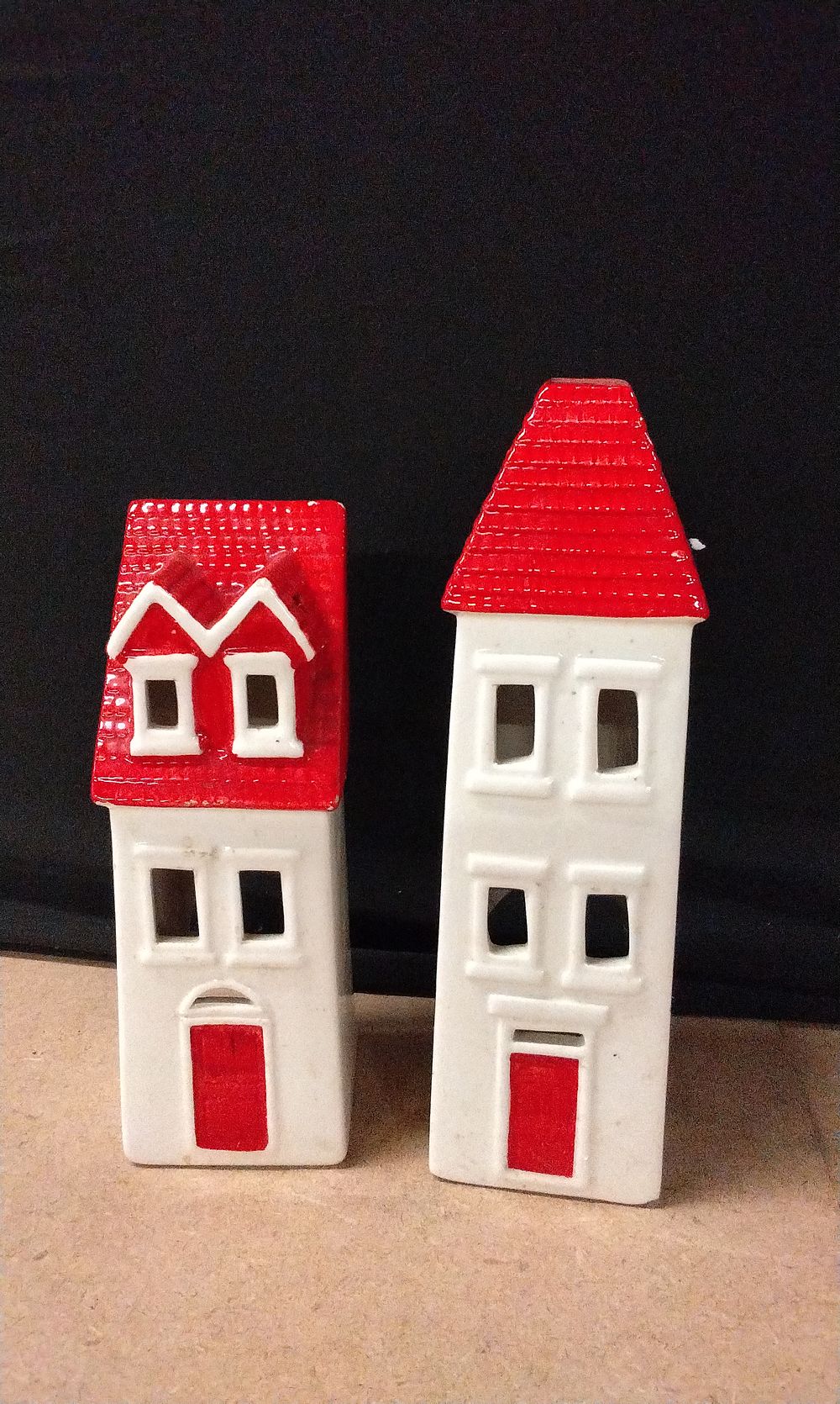 Lot 572: Two Red and White House Tea Light Holders