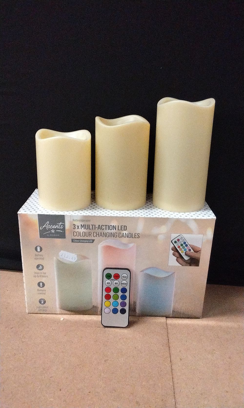 Lot 573: Premier Accents Set of Three Battery Operated Multi-Action Colour Changing Candles