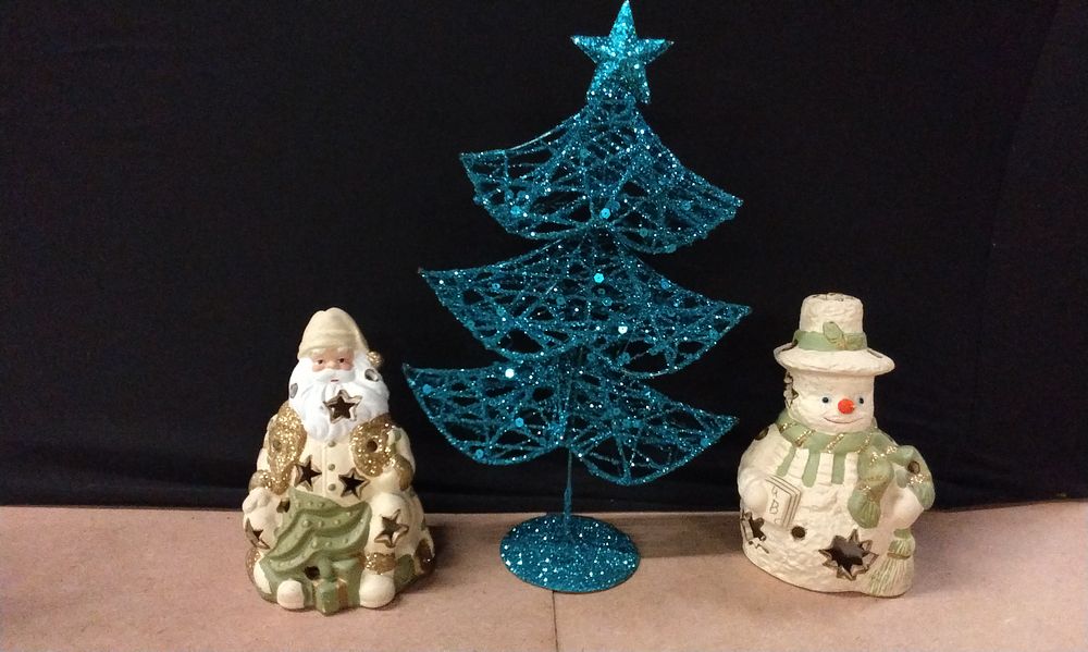 Lot 576: Two Ceramic Tealight Holders, Santa and a Snowman and a Aqua Blue Glitter Christmas Tree