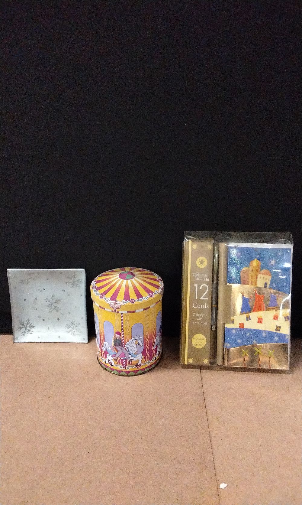 Lot 583: Silver Snowflake Trinket Dish, Musical Tin, and Pack of Christmas Cards with Pen
