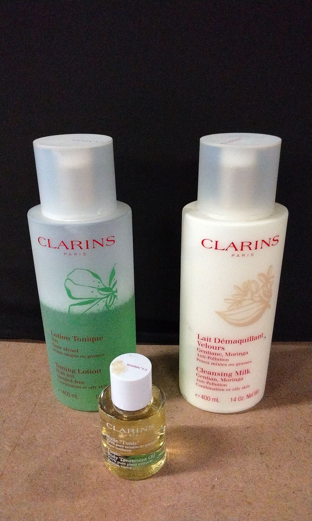 Lot 595: Three Clarins Products