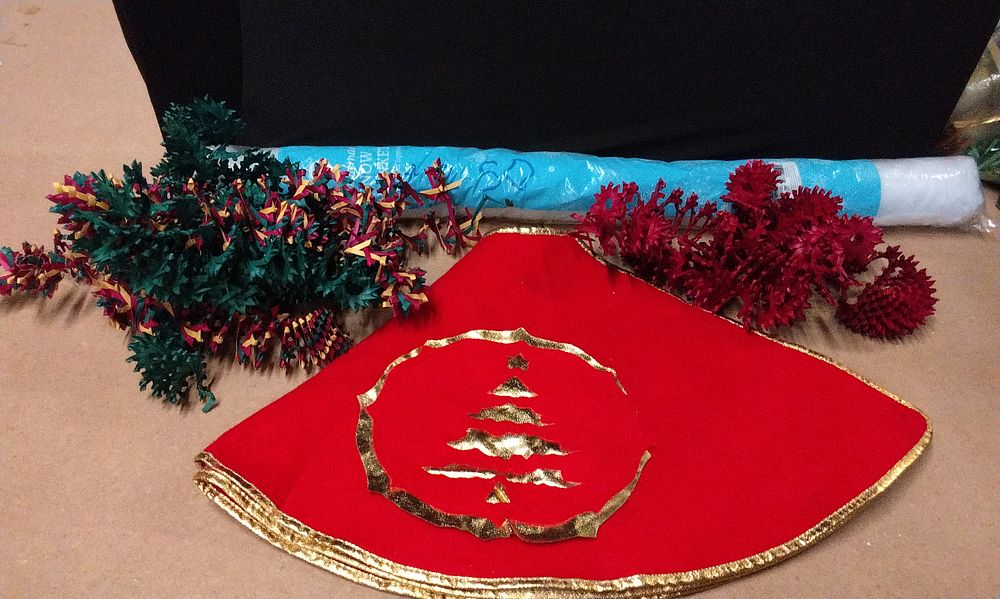Lot 601: Red/Gold Tree Skirt, Sno Blanket, two Woven Garland Decorations