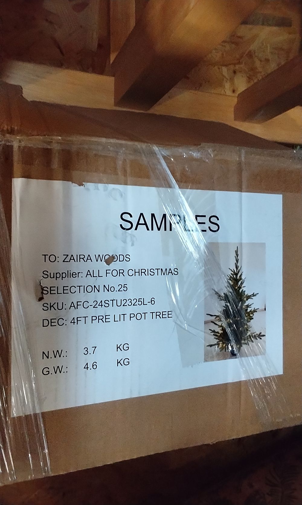 Lot 604: Pre Lit Multi Action Christmas Tree in Bronze Coloured Urn