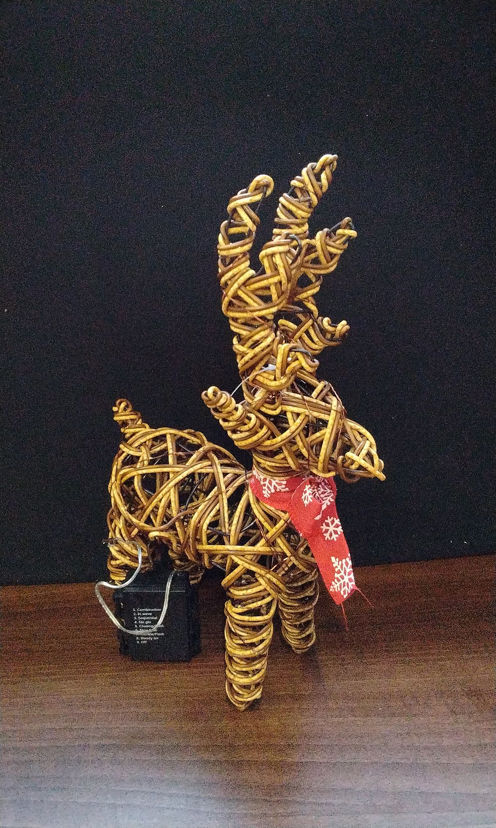 Lot 656: Battery Operated Wicker Reindeer