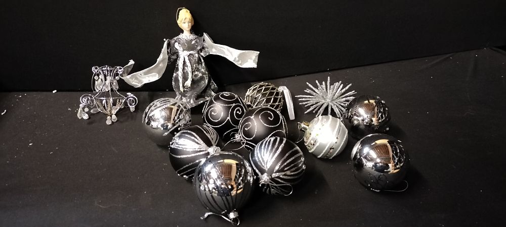 Lot 689: A Large Quantity of Silver and Black Baubles...