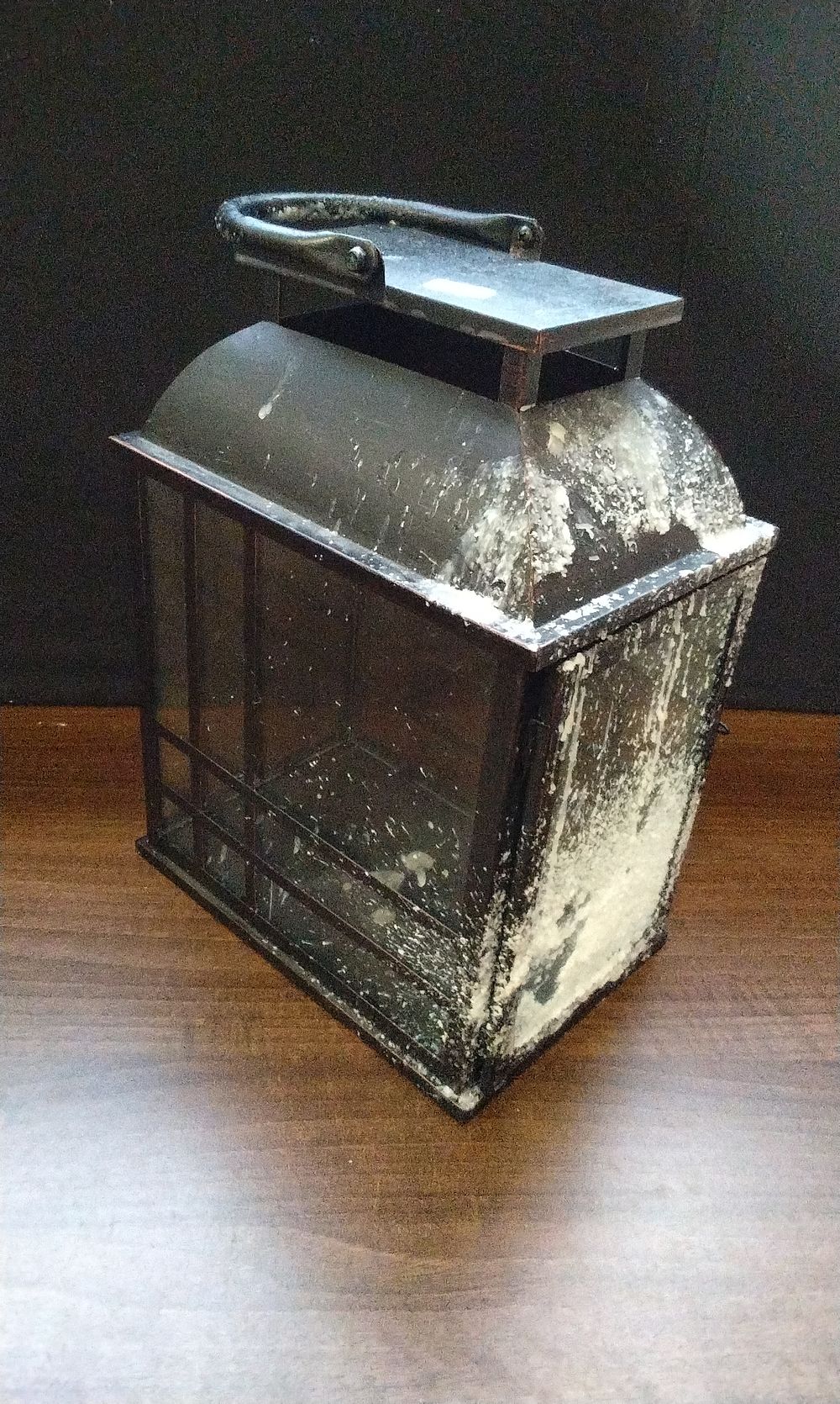 Lot 725: Large black Metal and glass lantern.