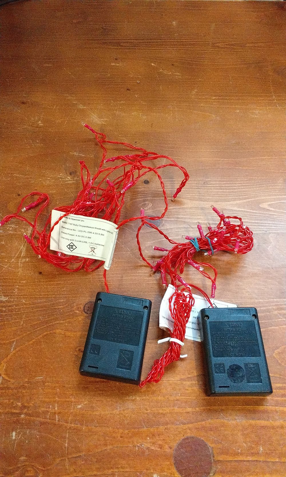 Lot 735: Two Sets of Battery Operated Led Lights with Red Cable