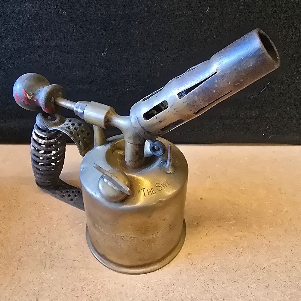 Lot 151: A Swedish Three Crowns Brass Blowtorch