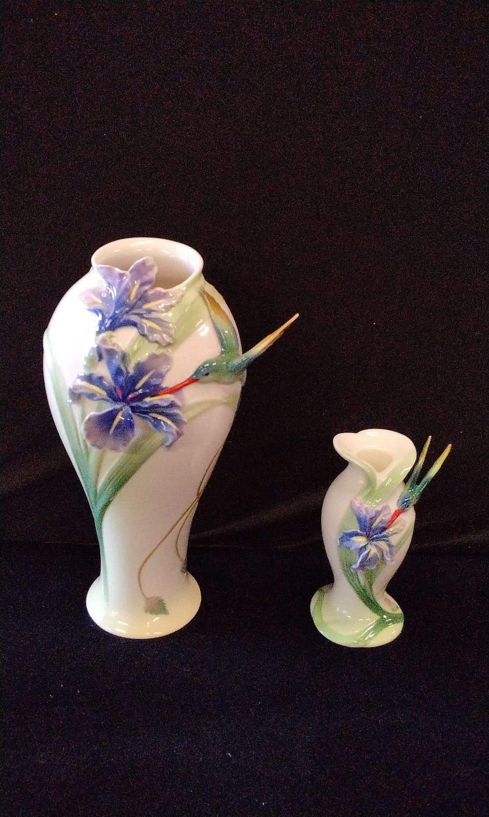 Lot 166: A Pair of Franz Porcelain Long Tail Hummingbird Iris Vases
