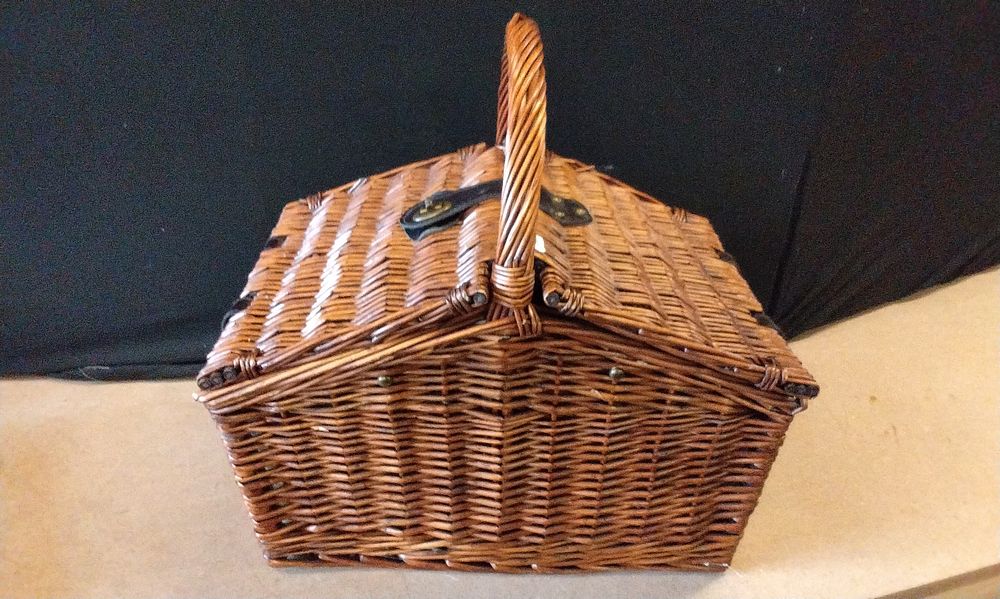 Lot 173: A Brown Wicker Picnic Basket with Accessories