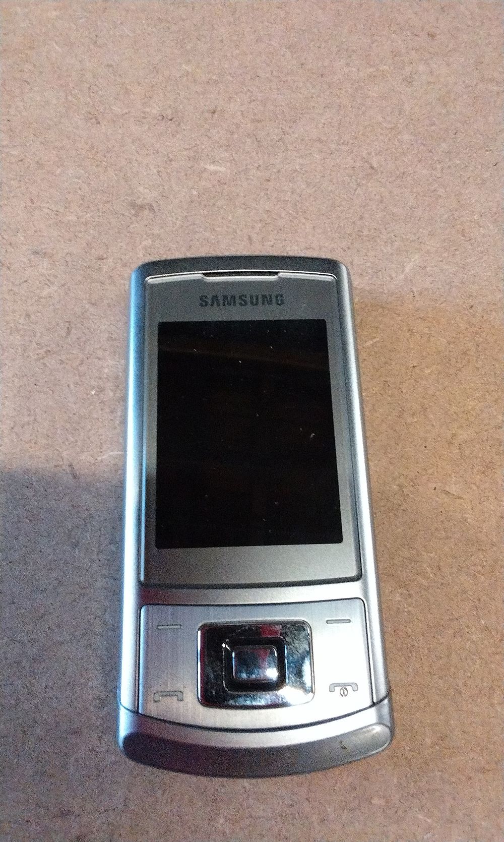 Lot 176: A Samsung S3500 Silver Slider Mobile Phone