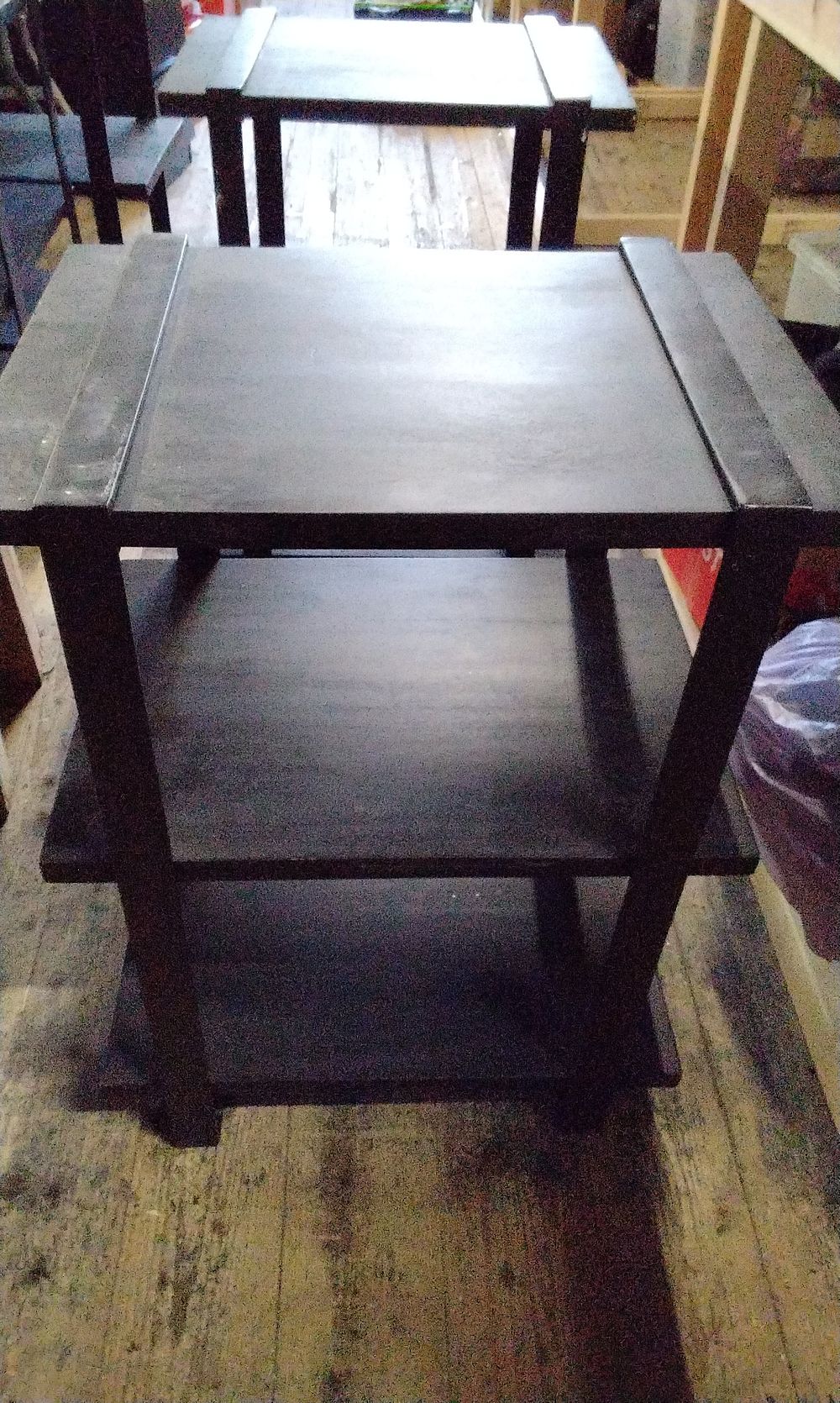 Lot 180: Two Black Three-Tiered Wooden End Table with Metal Banding