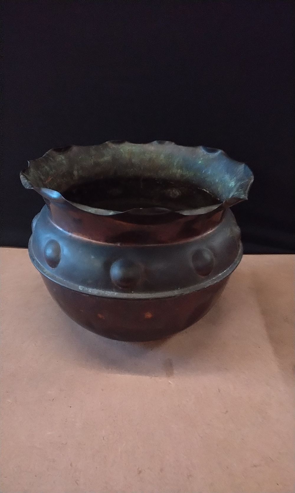 Lot 183: A Copper Pot with Fluted Rim and Studded Band