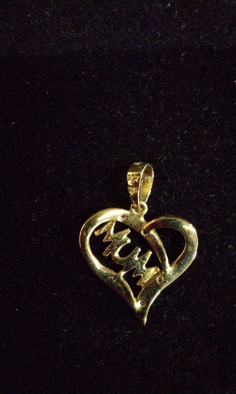 Lot 191: 9ct Gold Heart 'MUM' Pendant with Clear Stones