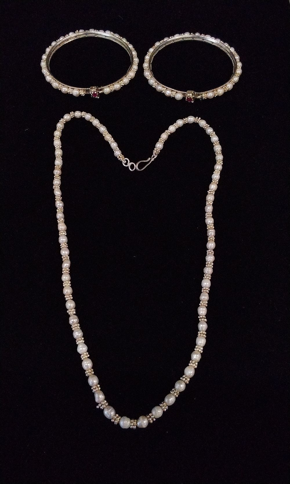 Lot 192: White Pearl and Continental Silver Necklace and Bangles